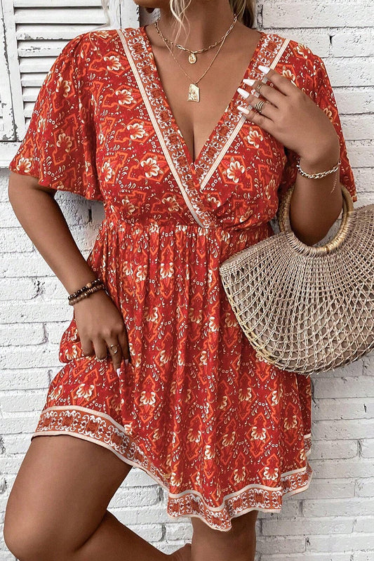 Somewhere Between Surplice Neck Empire Waist Flowy Mini Dress