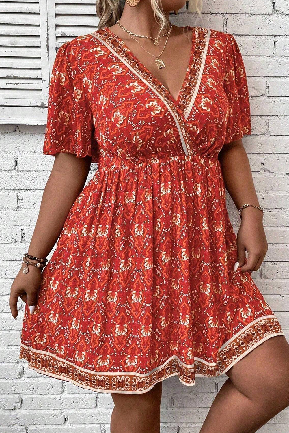 Somewhere Between Surplice Neck Empire Waist Flowy Mini Dress