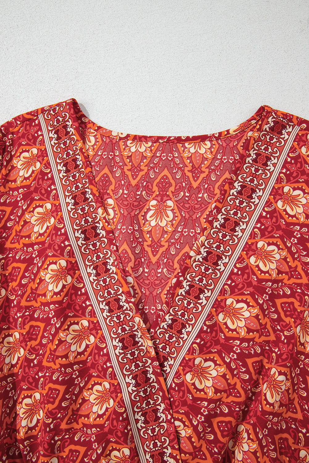 Somewhere Between Surplice Neck Empire Waist Flowy Mini Dress
