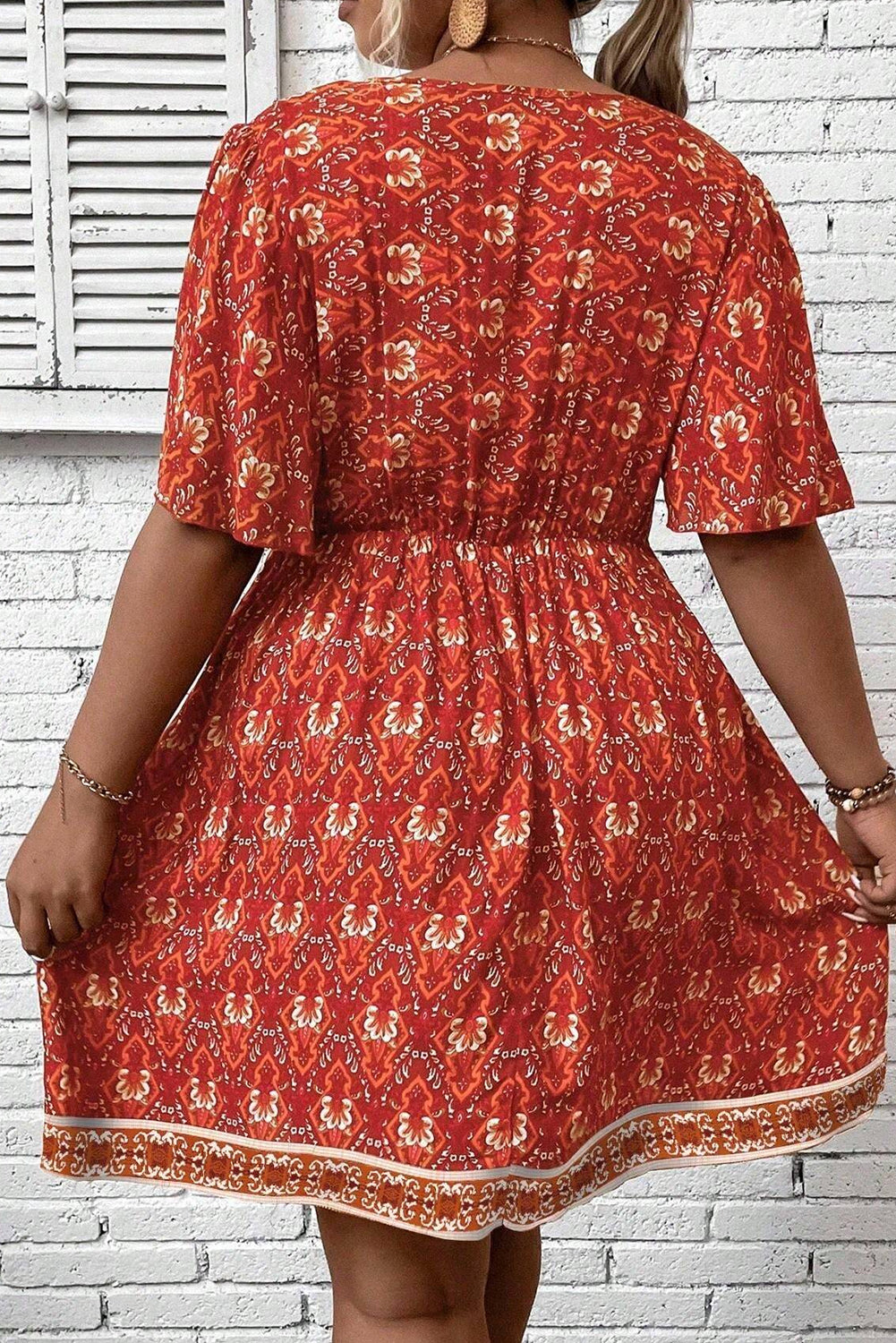 Somewhere Between Surplice Neck Empire Waist Flowy Mini Dress